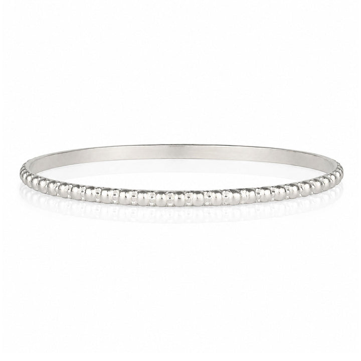 Niche Jewellery Charlotte's Web sterling silver Maharani stacking bangle with signature bubble detailing.