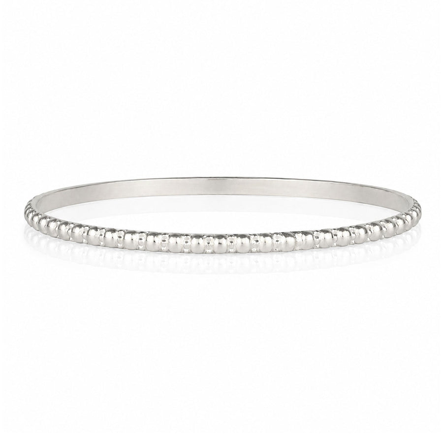 Niche Jewellery Charlotte's Web sterling silver Maharani stacking bangle with signature bubble detailing.