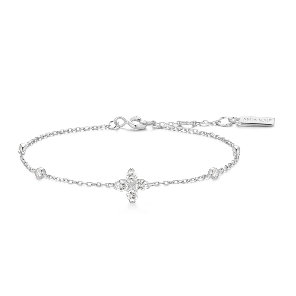 Niche Jewellery Ania Haie silver clover bracelet with sparkling cubic zirconia stones on a delicate chain.