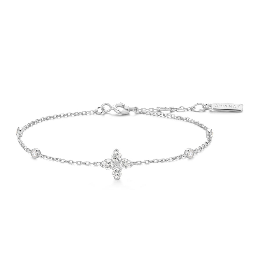 Niche Jewellery Ania Haie silver clover bracelet with sparkling cubic zirconia stones on a delicate chain.