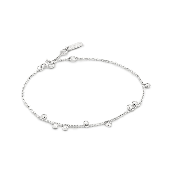 Niche Jewellery Ania Haie sterling silver bracelet featuring bezel-set cubic zirconia droplets on a fine chain.