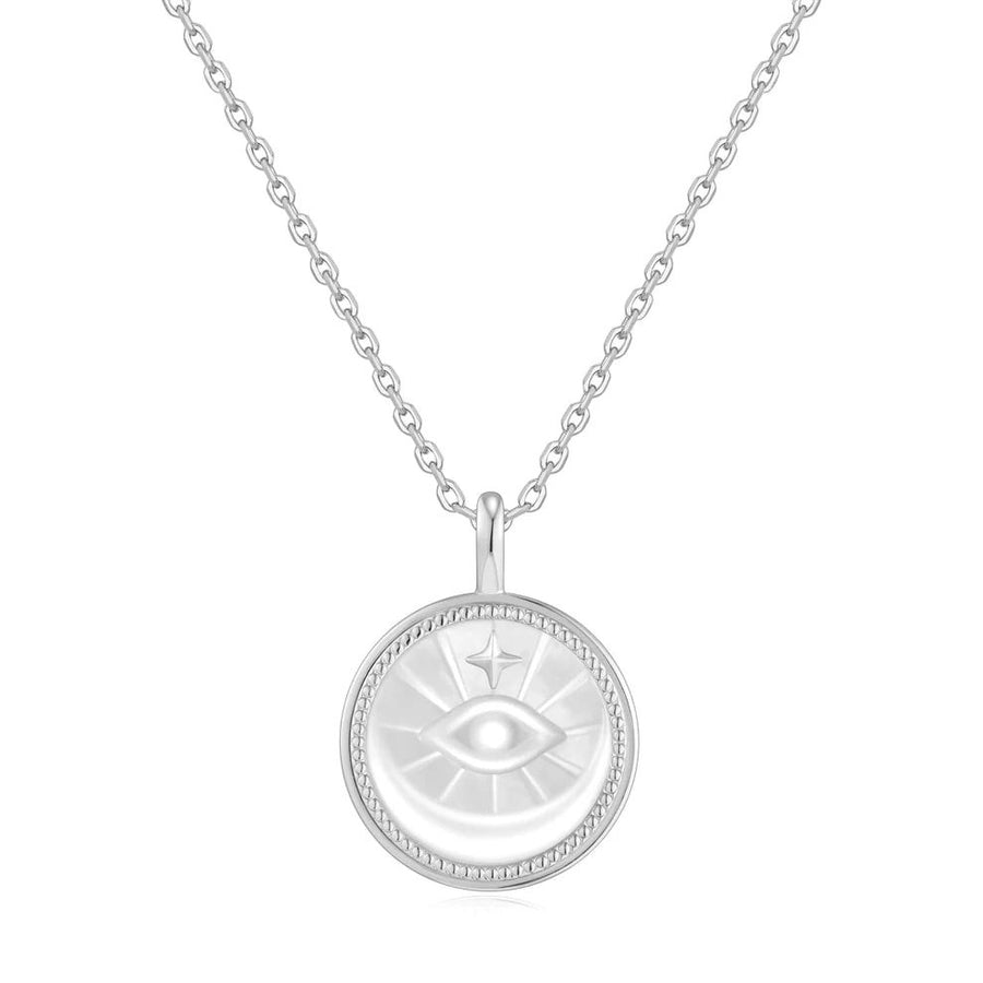 Niche Jewellery Ania Haie sterling silver necklace featuring a mother-of-pearl evil eye medallion pendant.
