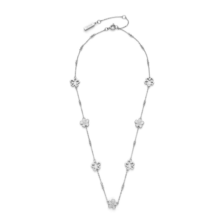Niche Jewellery Olivia Burton silver tone necklace featuring delicate forget-me-not floral charms on a fine chain.