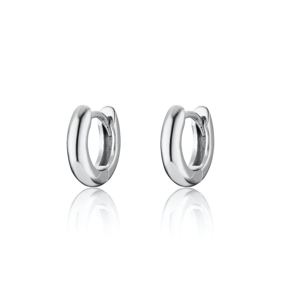 Niche Jewellery Scream Pretty sterling silver mini huggie hoop earrings for everyday wear.