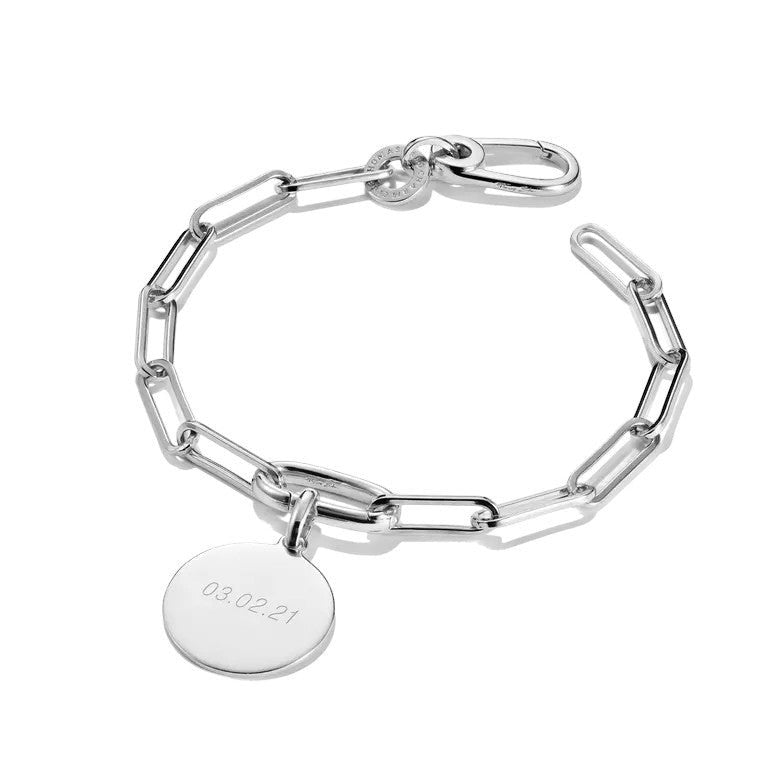 Niche Jewellery Thomas Sabo silver paperclip charm bracelet with oval links and a circular engraved charm.