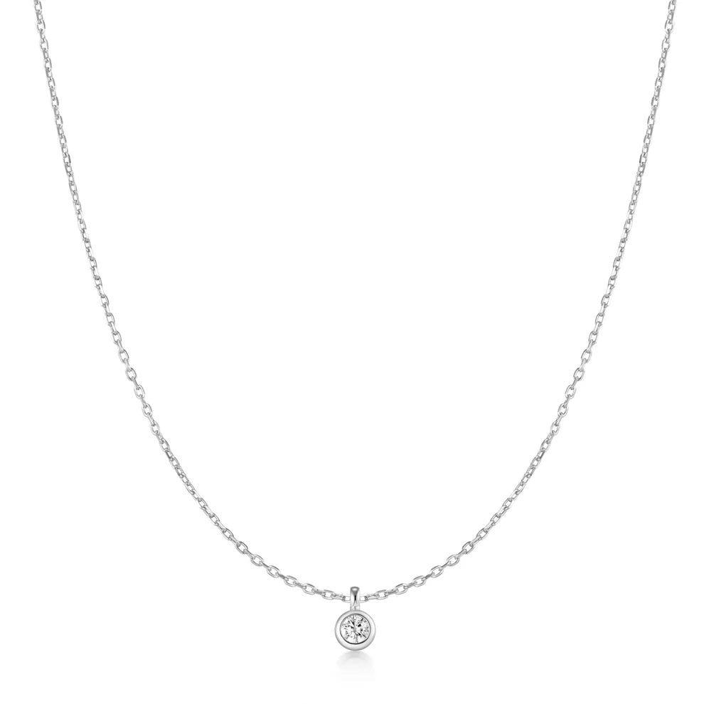 Niche Jewellery Ania Haie sterling silver necklace featuring a single bezel-set cubic zirconia solitaire pendant.