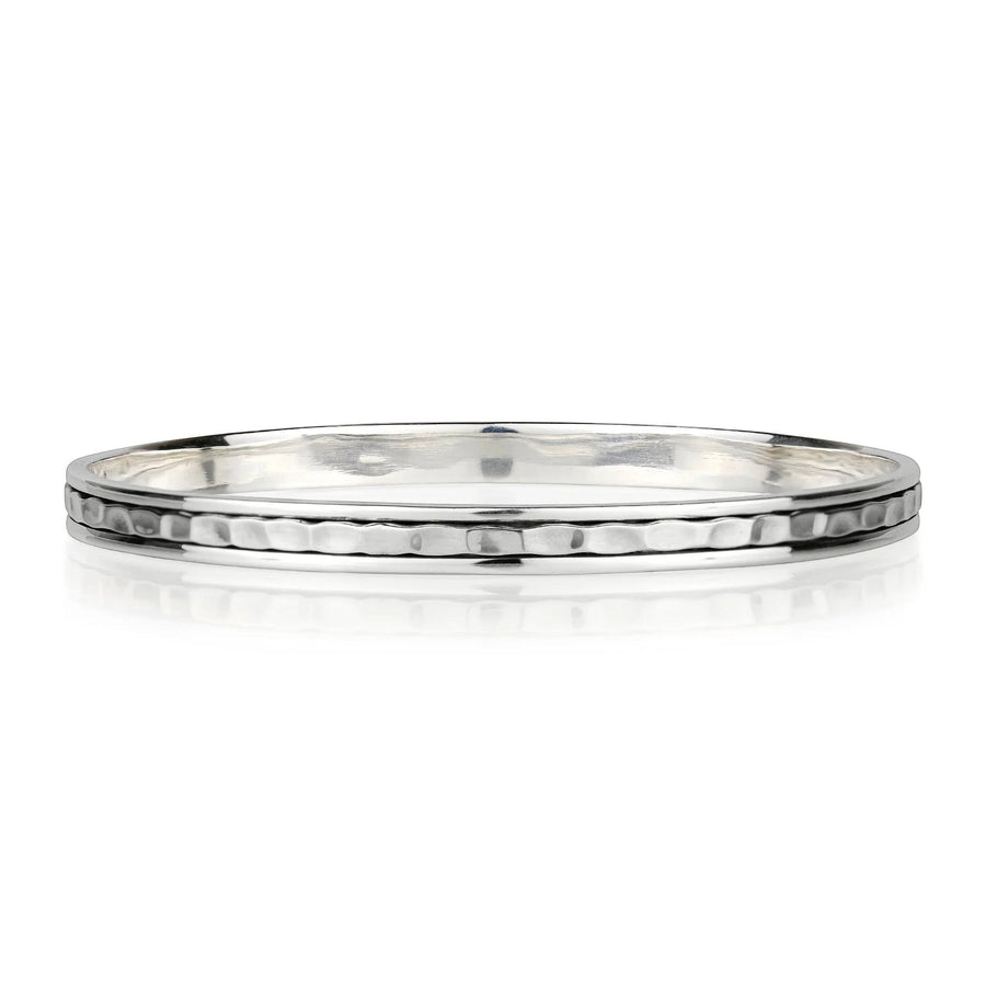 Niche Jewellery Charlotte's Web sterling silver stacking bangle with a hammered texture and a spinning band.