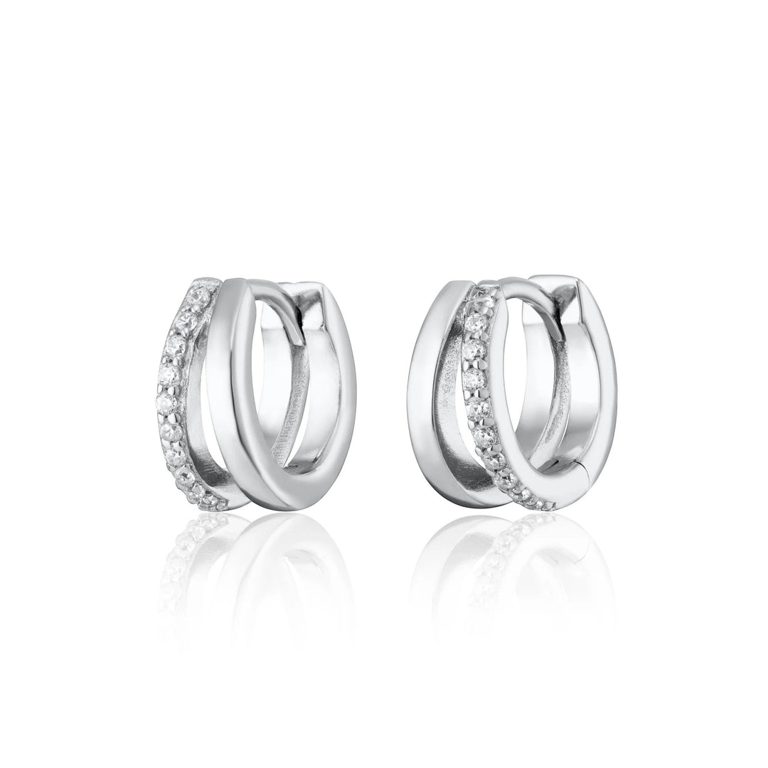 Niche Jewellery Scream Pretty silver mini huggie earrings with a split design and sparkling cubic zirconia stones.