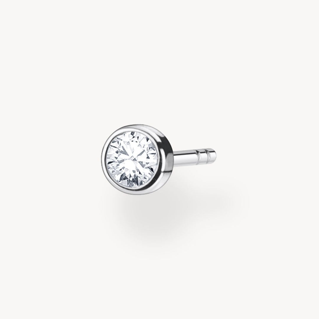 Niche Jewellery single round sterling silver stud earring with a white zirconia stone, bezel set.