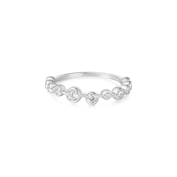 Niche Jewellery Ania Haie sterling silver ring featuring a zig-zag band with bezel-set sparkling cubic zirconia stones.