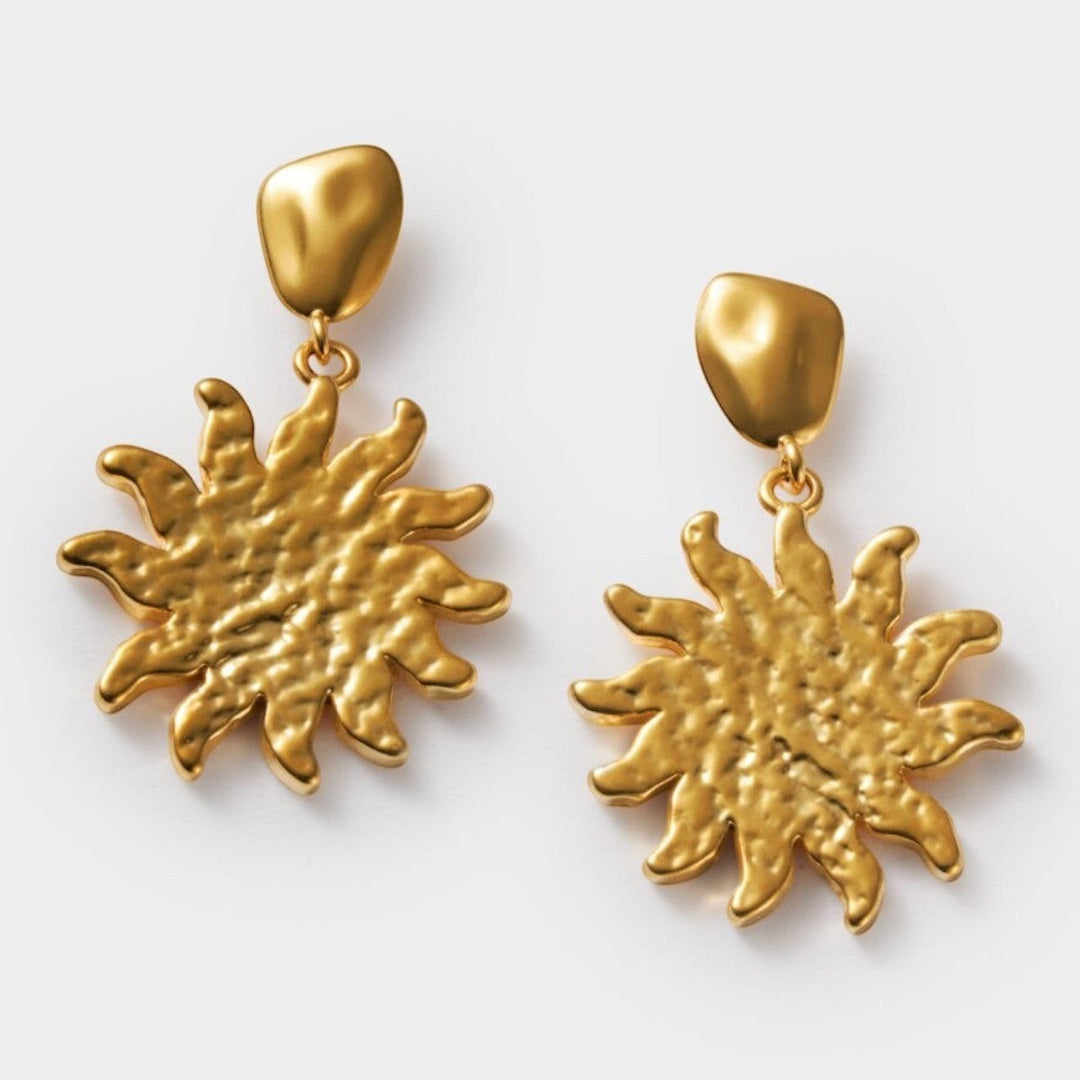 Niche Jewellery: Katie Loxton Solesi Sun Waterproof Gold Earrings featuring a textured sun charm with 18K Gold PVD coating.