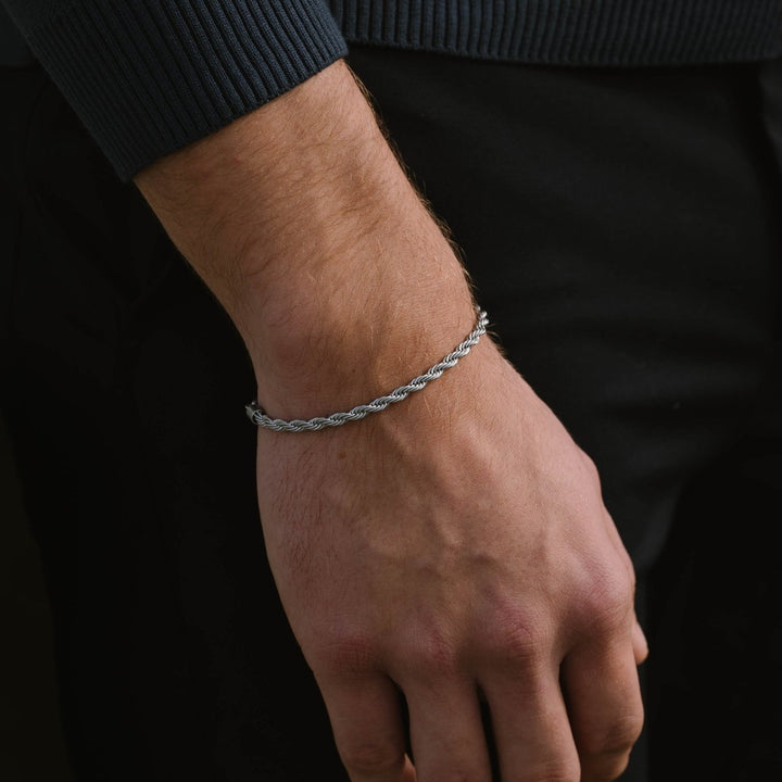 Niche Jewellery Steel & Barnett stainless steel rope chain bracelet on a man's wrist with a DNA-inspired twist design