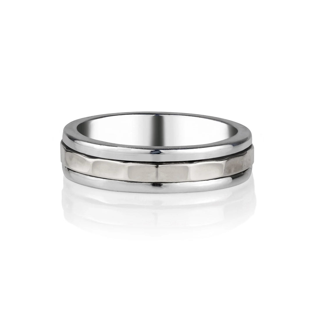 Niche Jewellery Charlotte's Web sterling silver unisex spinning ring with a hammered texture band for fidgeting.