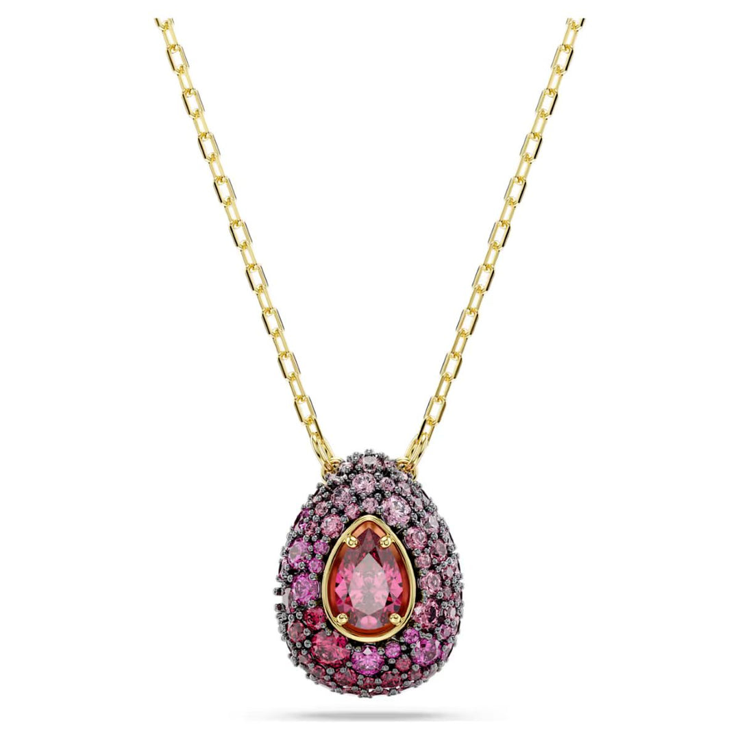 Niche Jewellery Swarovski Sublima necklace featuring a pear-cut red crystal pendant with pink pavé on gold finish