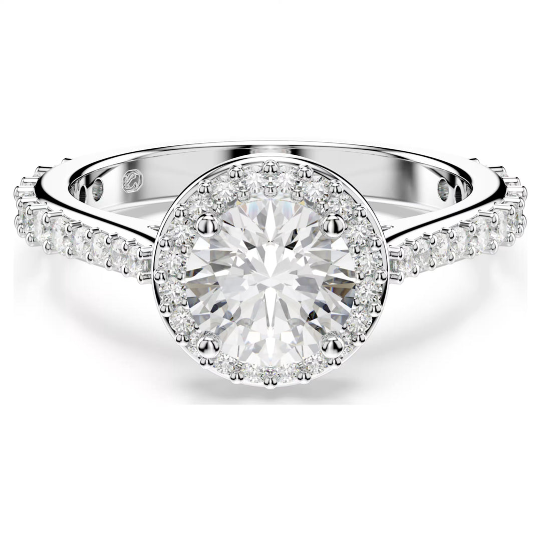 Niche Jewellery Swarovski Una Angelic ring featuring a round-cut clear crystal with a pavé halo on a silver-tone band.