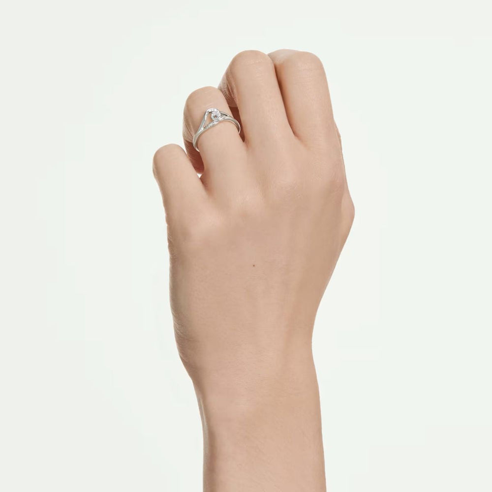 Niche Jewellery Swarovski Classica interlocking sterling silver ring with round-cut white stones on a hand