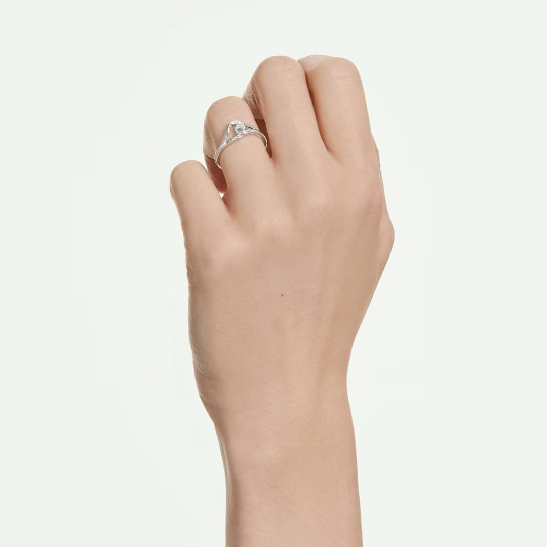 Niche Jewellery Swarovski Classica interlocking sterling silver ring with round-cut white stones on a hand