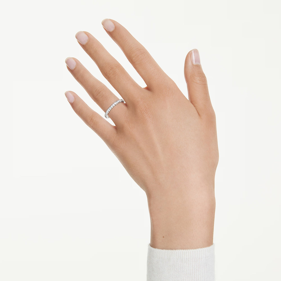 Niche Jewellery Swarovski eternity band with 0.43ct round lab-grown diamonds set in sterling silver on a hand.