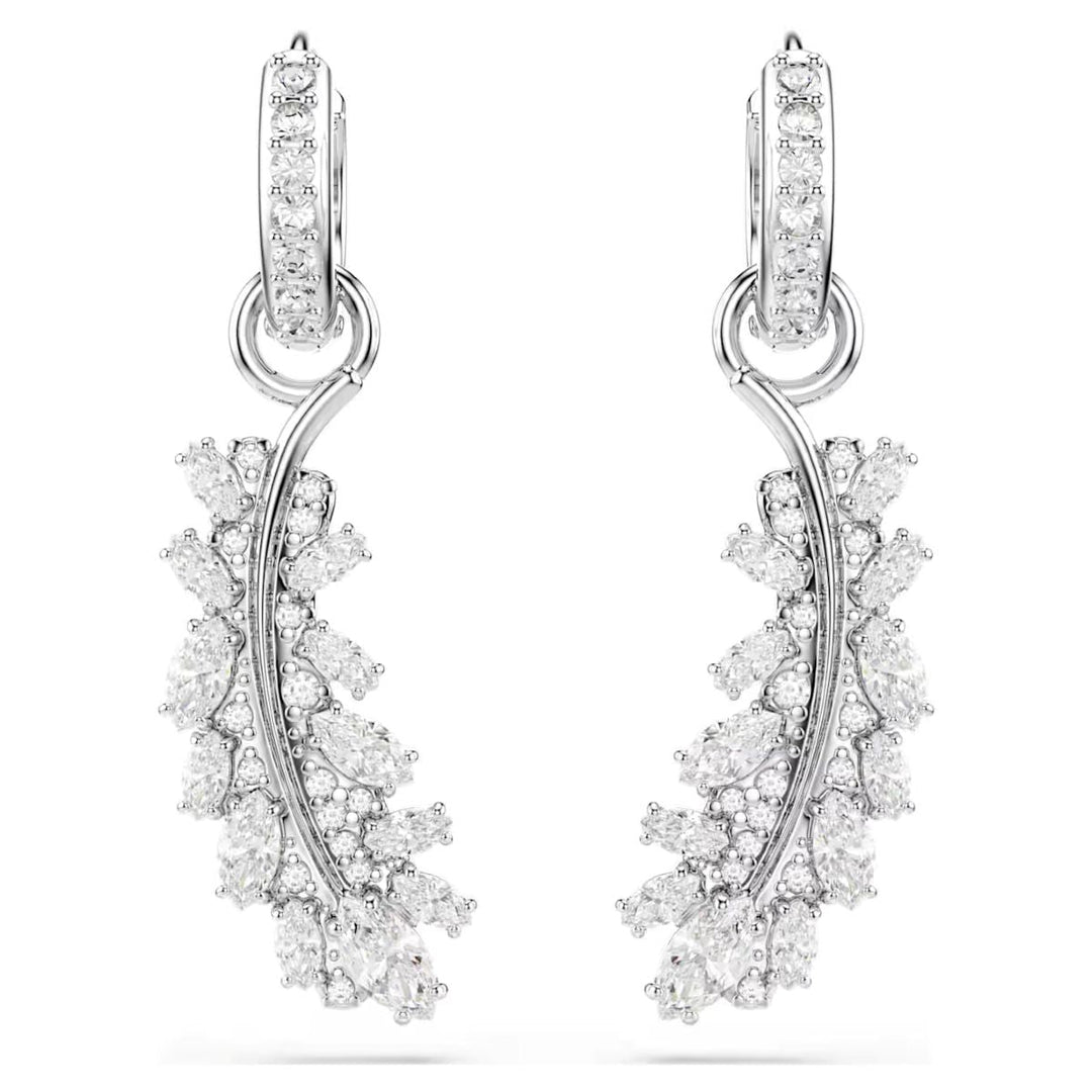 Niche Jewellery Swarovski Vienna feather earrings featuring white crystals and rhodium plating in mixed cuts.