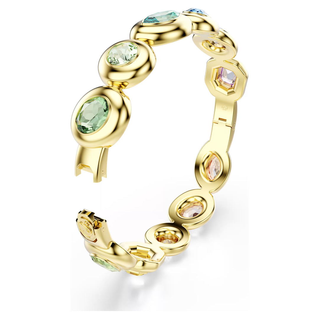 Niche Jewellery Swarovski Gema bangle featuring mixed cut multicoloured crystals set in gold tone plated metal