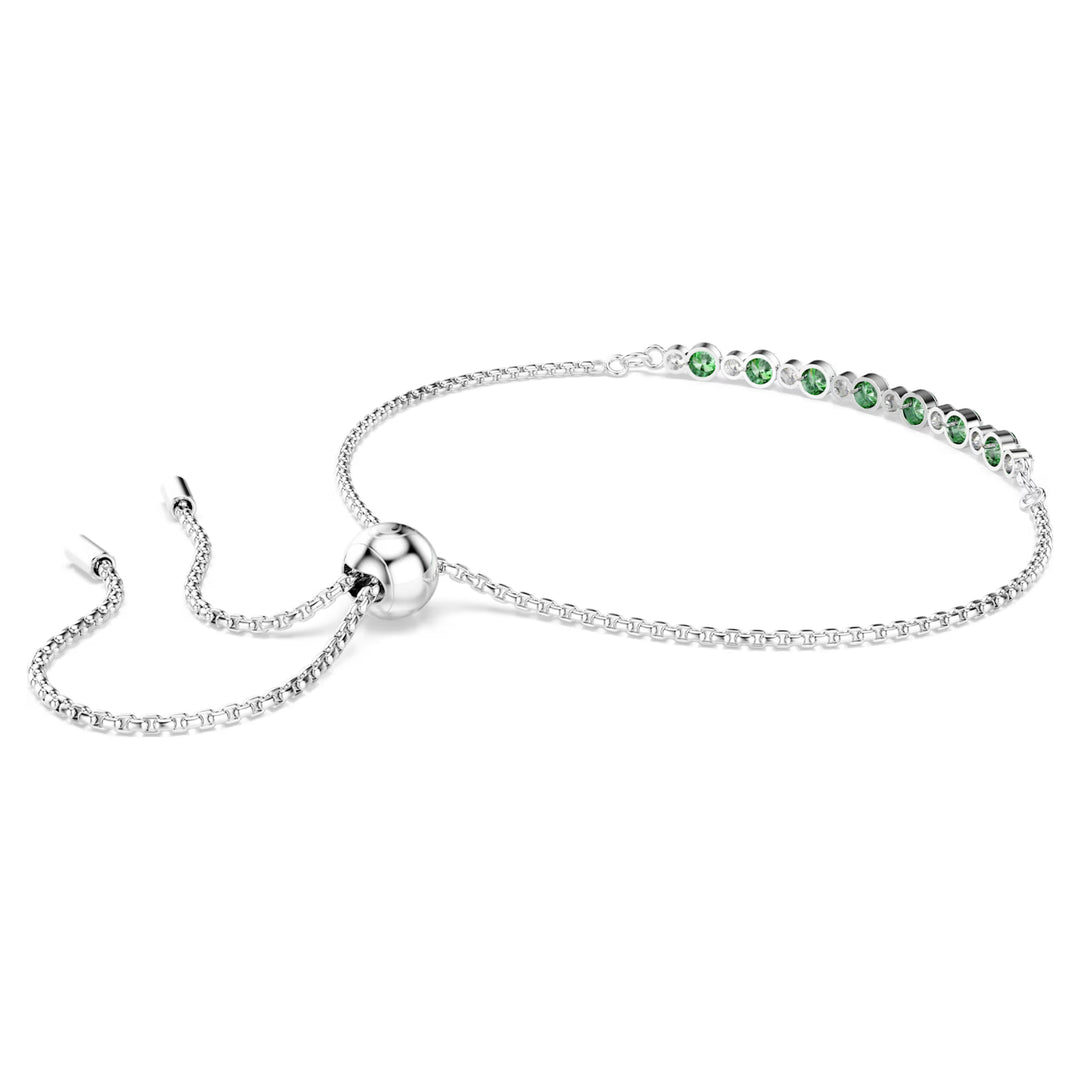 Niche Jewellery Swarovski Matrix slider bracelet with round green crystals and rhodium-plated chain.
