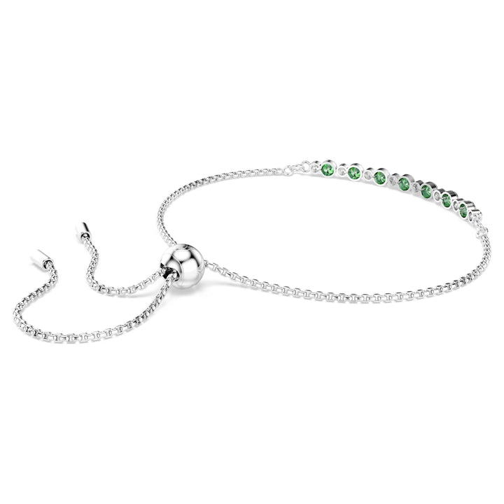 Niche Jewellery Swarovski Matrix slider bracelet with round green crystals and rhodium-plated chain.
