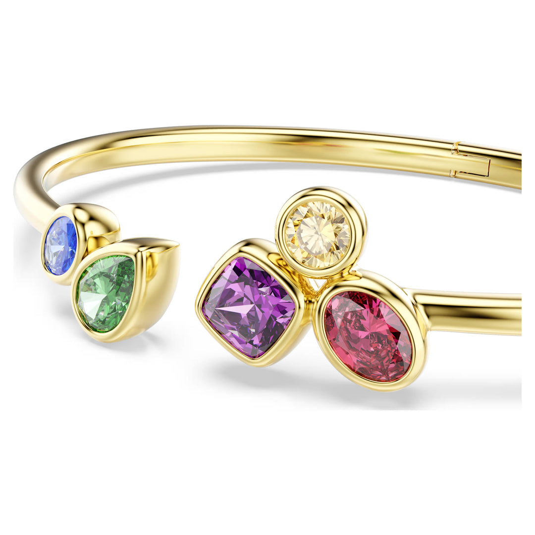 Niche Jewellery Swarovski Imber bangle featuring multicoloured mixed-cut crystals set in an 18K gold-finished band.