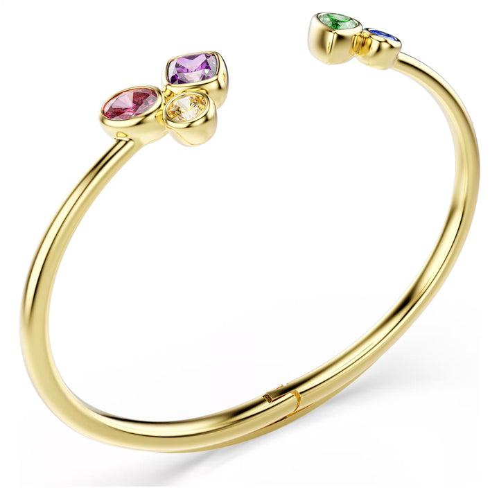 Niche Jewellery Swarovski Imber bangle featuring multicoloured mixed-cut crystals on an 18K gold-finished open band.