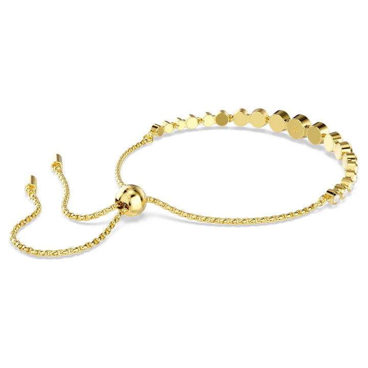 Niche Jewellery Swarovski Imber tennis bracelet with white round crystals and gold-tone sliding adjustable chain.
