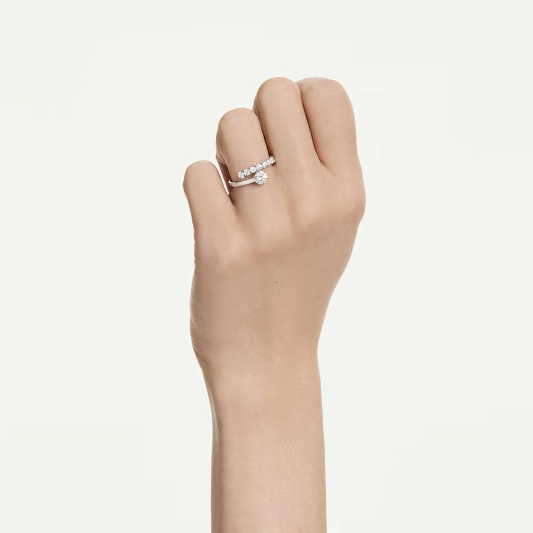 Niche Jewellery Swarovski Matrix open ring with rhodium plating and round-cut zirconia on a model's finger