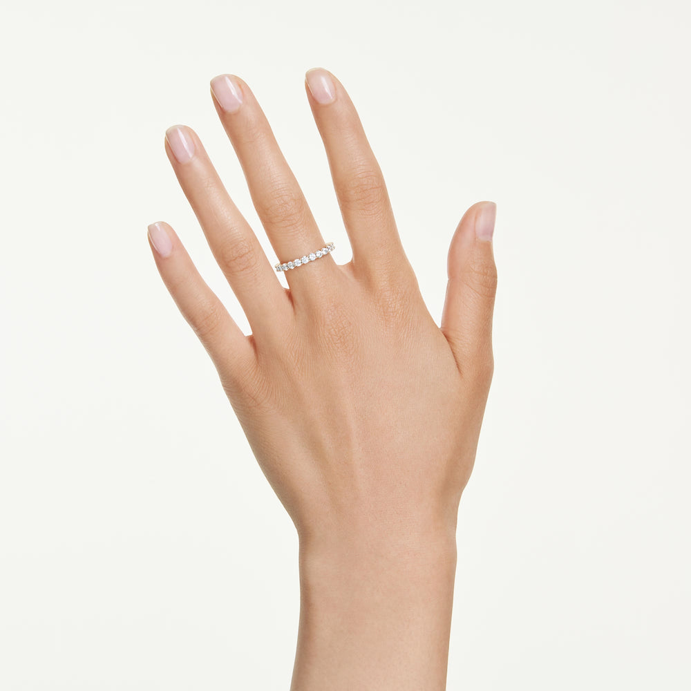 Niche Jewellery Swarovski Matrix Vittore band ring with round-cut white crystals on a gold-tone plated band on hand