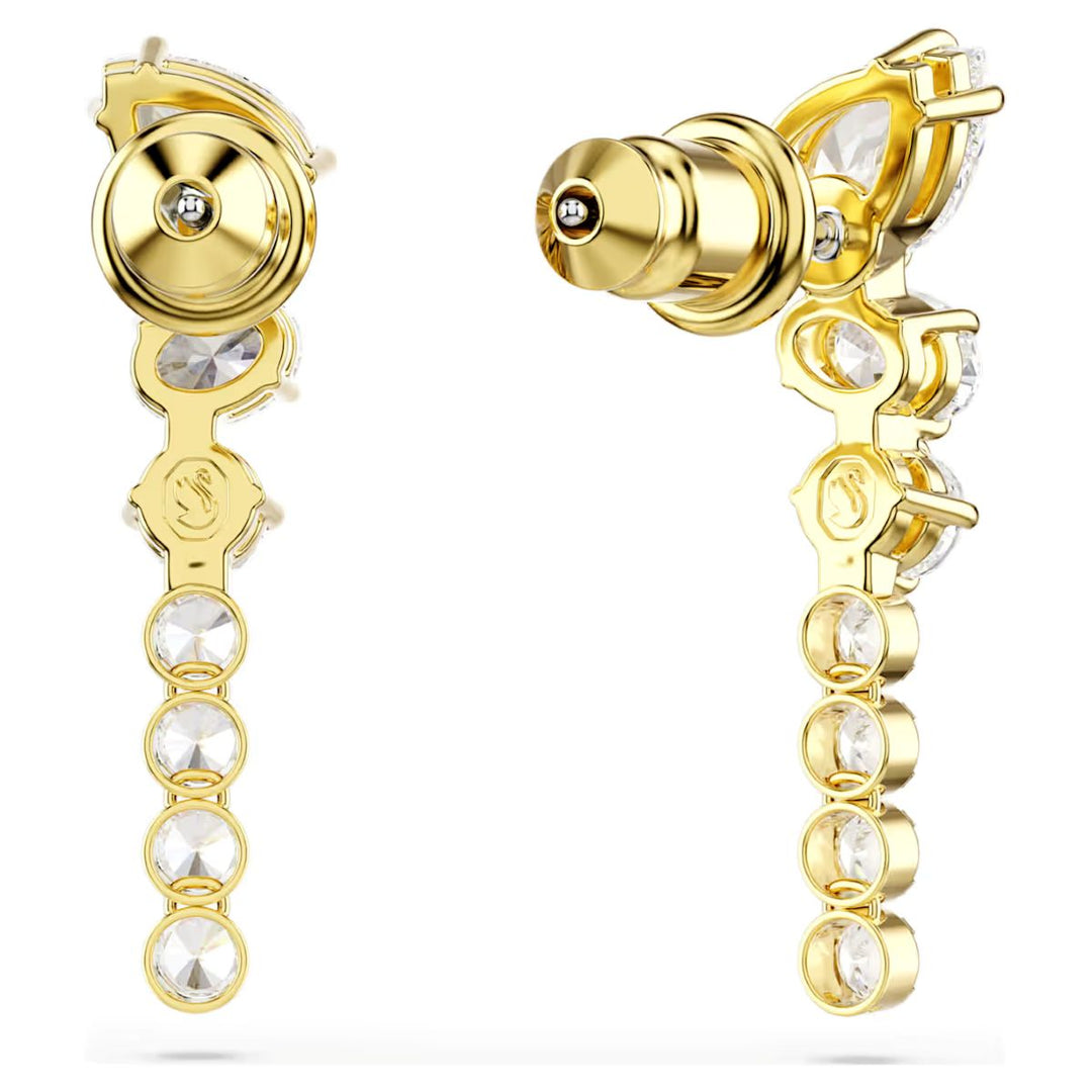 Niche Jewellery Swarovski Mesmera drop earrings featuring mixed cut white zirconia stones in 18k gold plated settings.