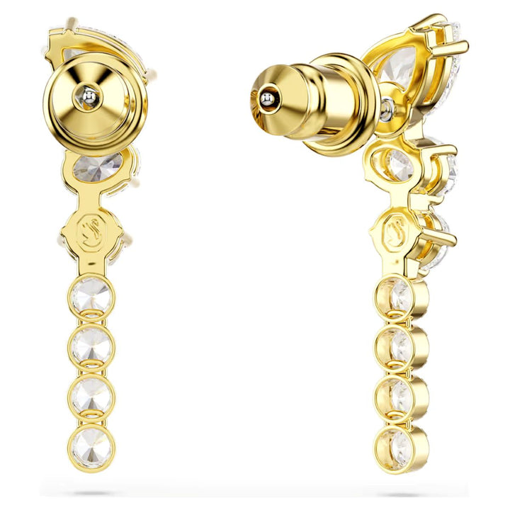 Niche Jewellery Swarovski Mesmera drop earrings featuring mixed cut white zirconia stones in 18k gold plated settings.