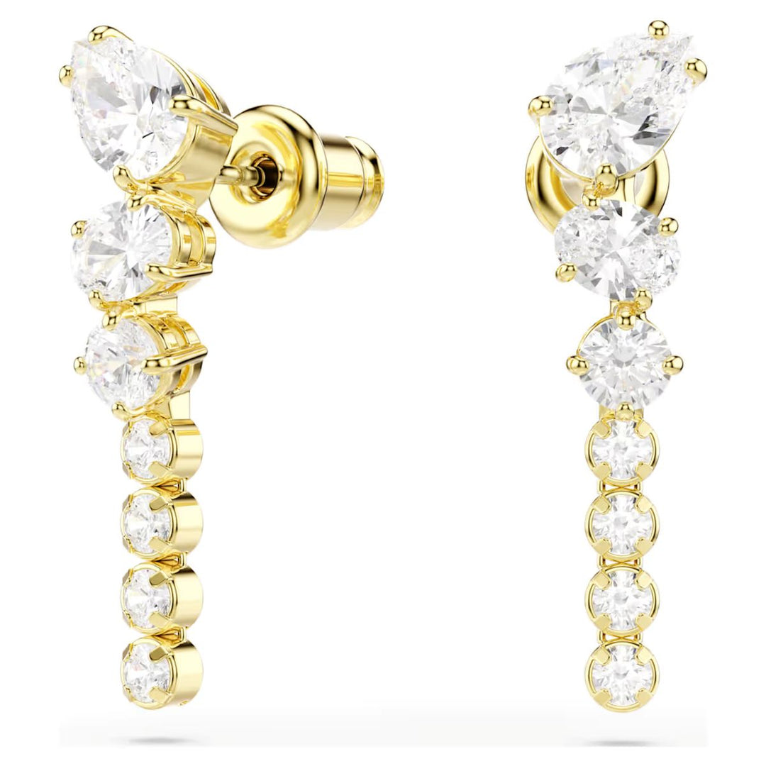 Niche Jewellery Swarovski Mesmera drop earrings featuring mixed-cut white zirconia stones in 18k gold-plated settings.