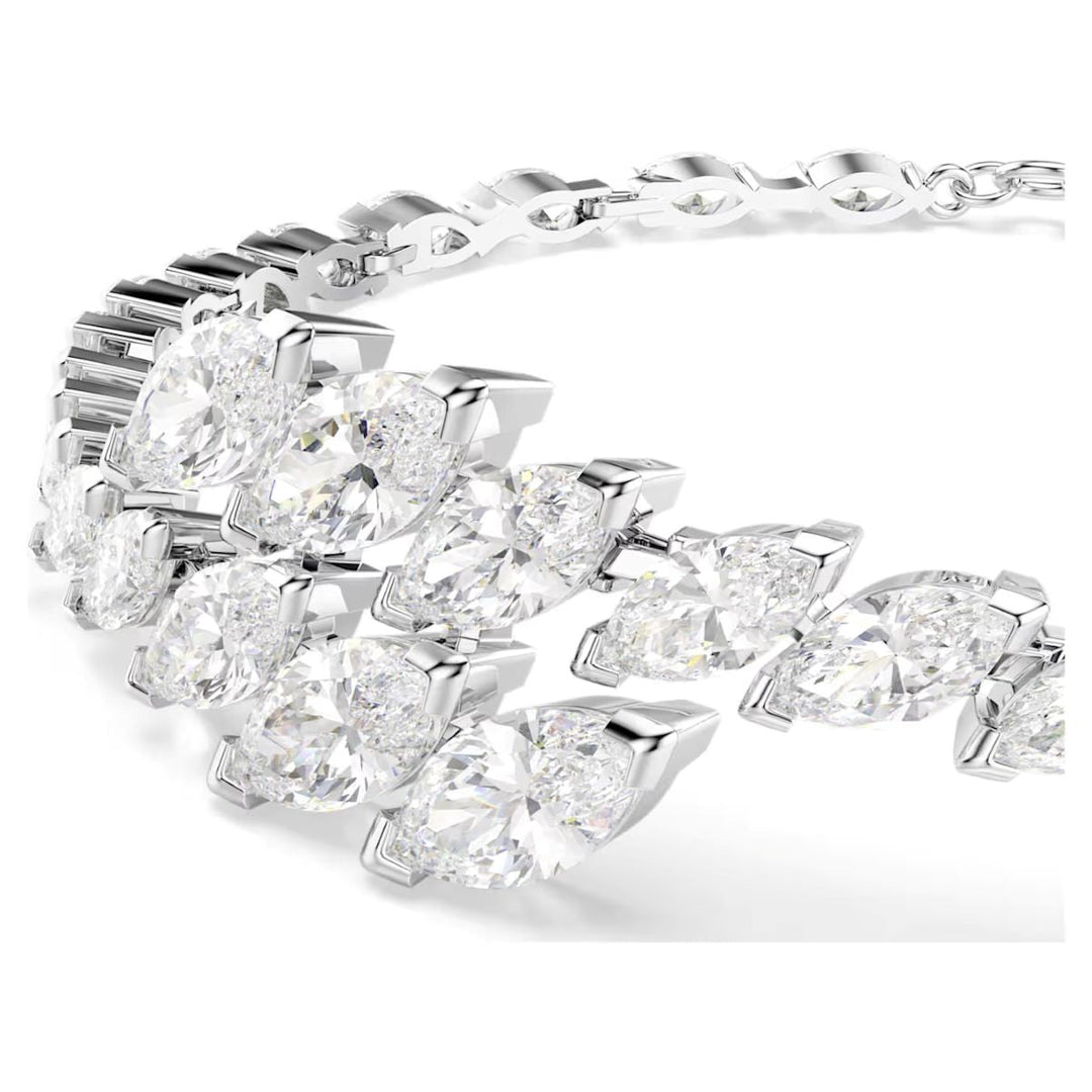 Niche Jewellery Swarovski Mesmera bracelet featuring marquise-cut white crystals in a gradient design, rhodium plated.