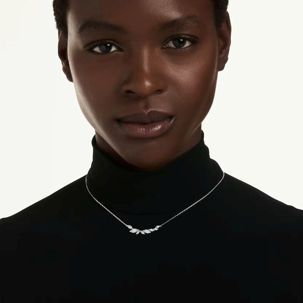 Niche Jewellery Swarovski Mesmera necklace featuring marquise-cut clear crystals on a rhodium-plated chain on a model