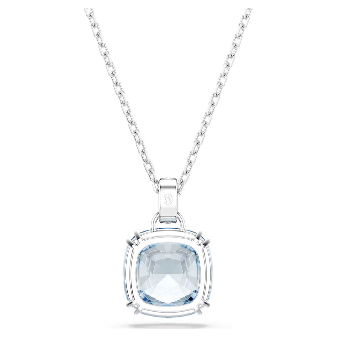 Niche Jewellery Swarovski Millenia pendant necklace featuring a blue cushion-cut crystal on a rhodium-plated chain.