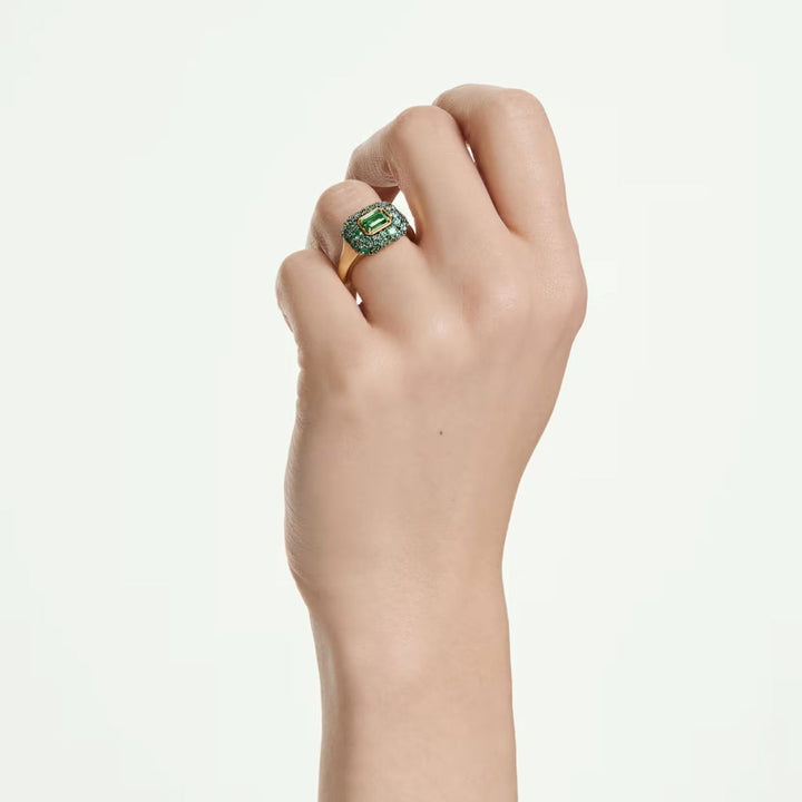 Niche Jewellery Swarovski Sublima cocktail ring featuring a green octagon crystal on an 18K gold-finished band