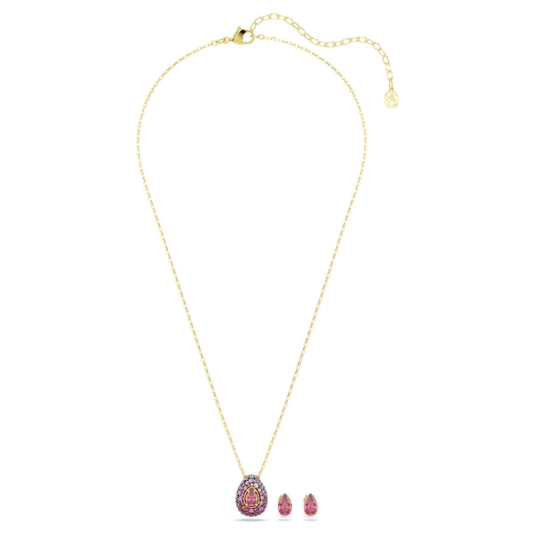 Niche Jewellery Swarovski Sublima set featuring a pear-cut red crystal necklace and matching earrings in gold finish.