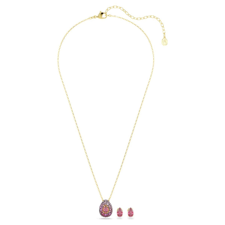 Niche Jewellery Swarovski Sublima set featuring a pear-cut red crystal necklace and matching earrings in gold finish.