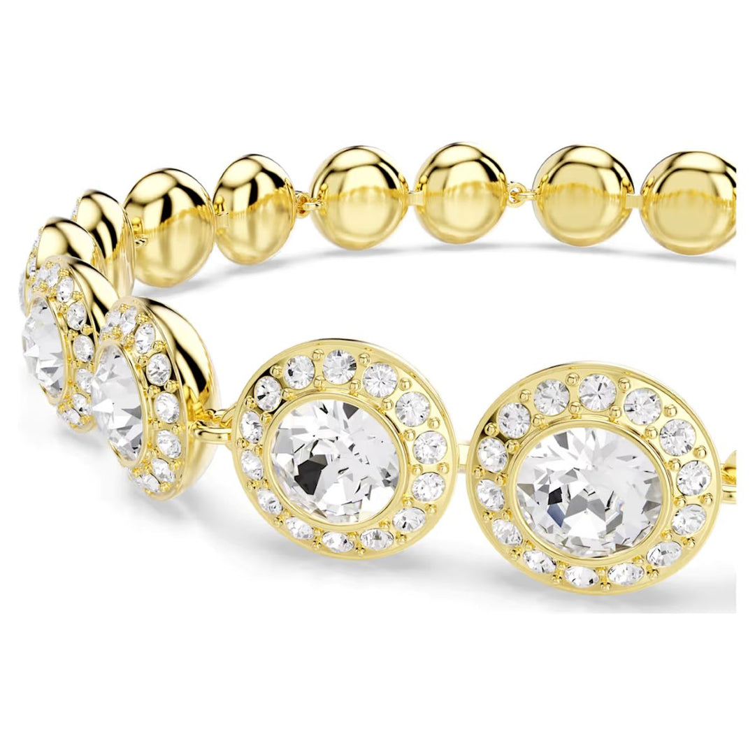 Niche Jewellery Swarovski Una Angelic bracelet featuring gold-tone plating and sparkling white crystal halo links.