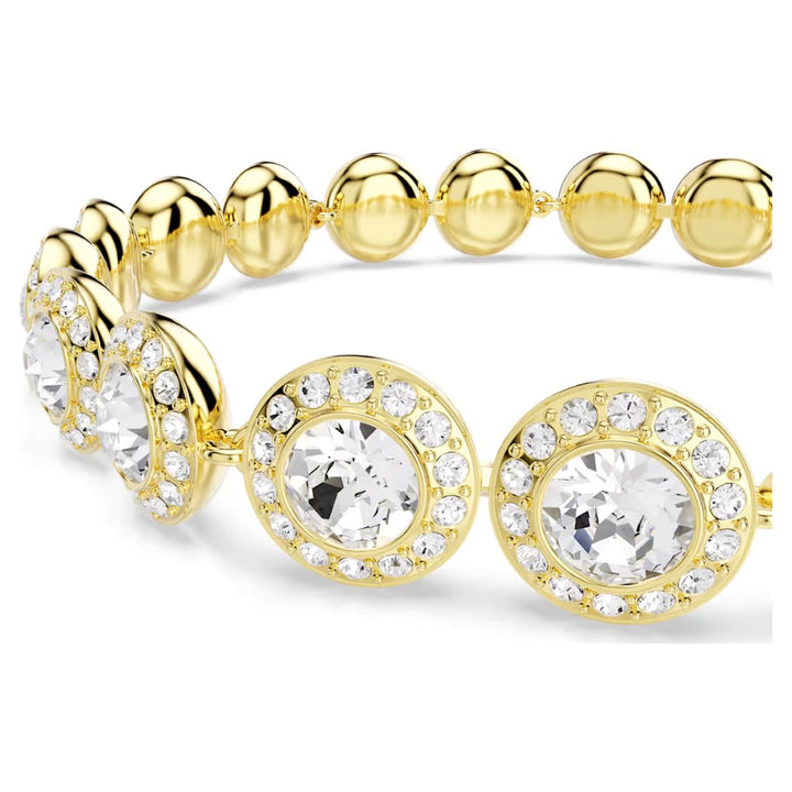 Niche Jewellery Swarovski Una Angelic bracelet featuring gold-tone plating and sparkling white crystal halo links.