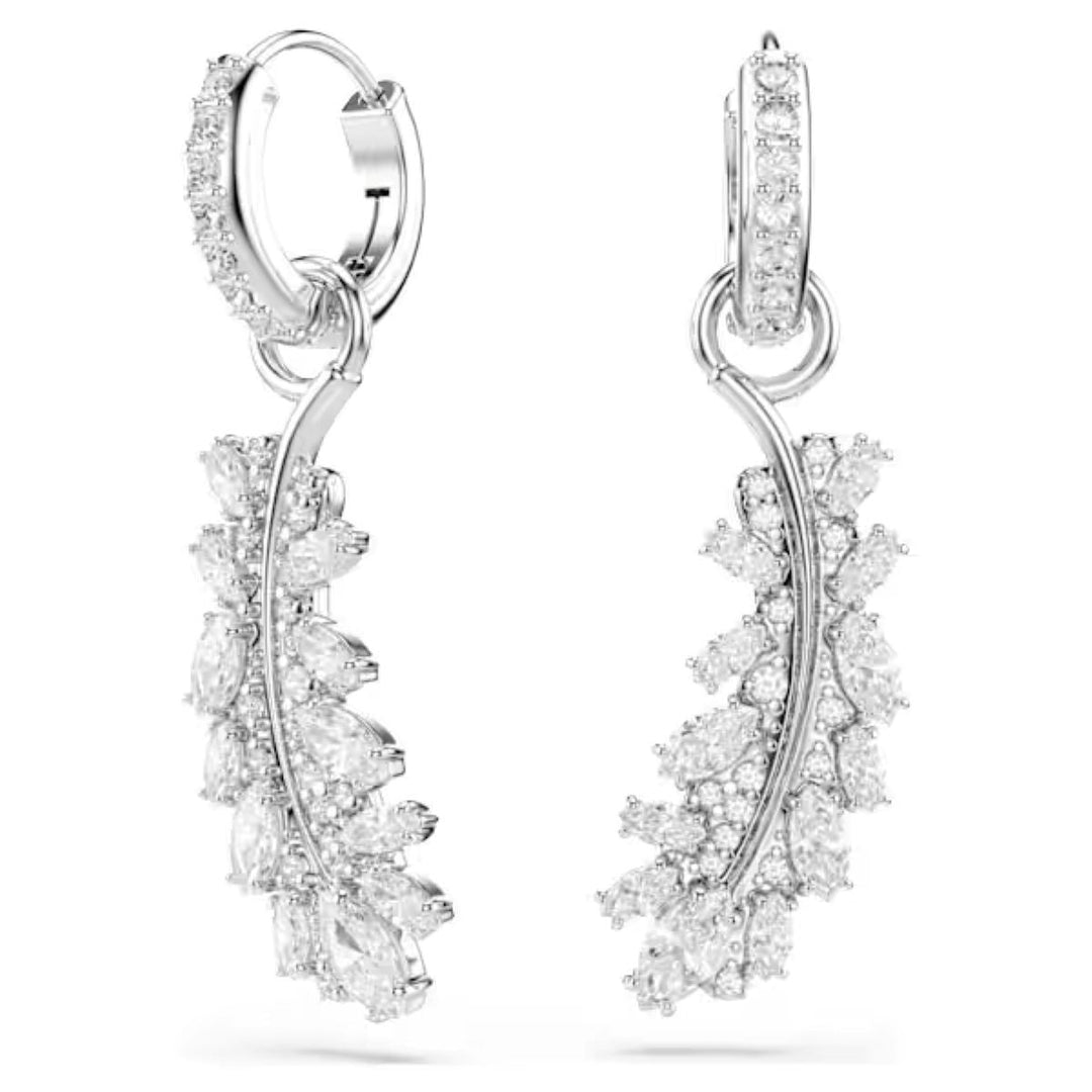 Niche Jewellery Swarovski Vienna feather earrings in rhodium plating with white mixed-cut crystals on hoop closures.