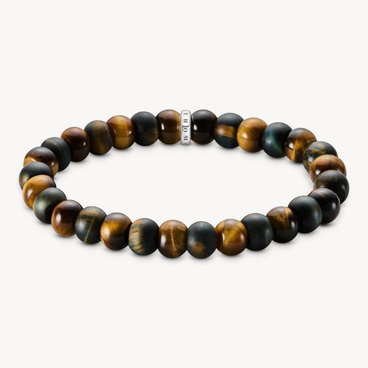 Niche Jewellery Thomas Sabo bracelet with gold-brown and blue-gold tiger's eye beads, 9mm. Symbolises protection and courage.