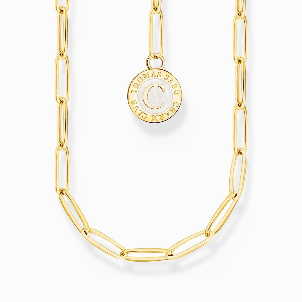 Niche Jewellery Thomas Sabo gold-plated sterling silver necklace with white Charmista disc charm featuring a 'C'.