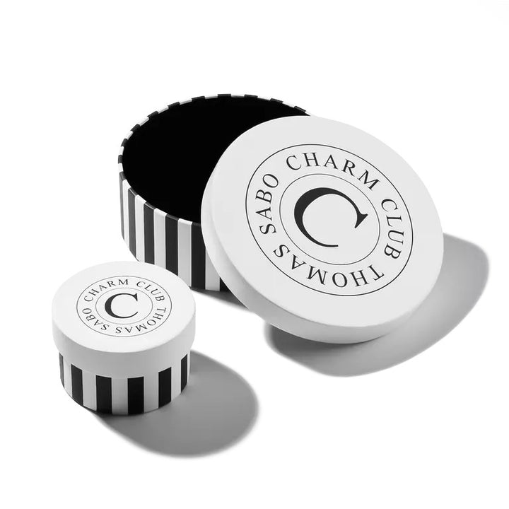 Thomas Sabo Charm Club infinity pendant in recycled sterling silver with white zirconia stones.