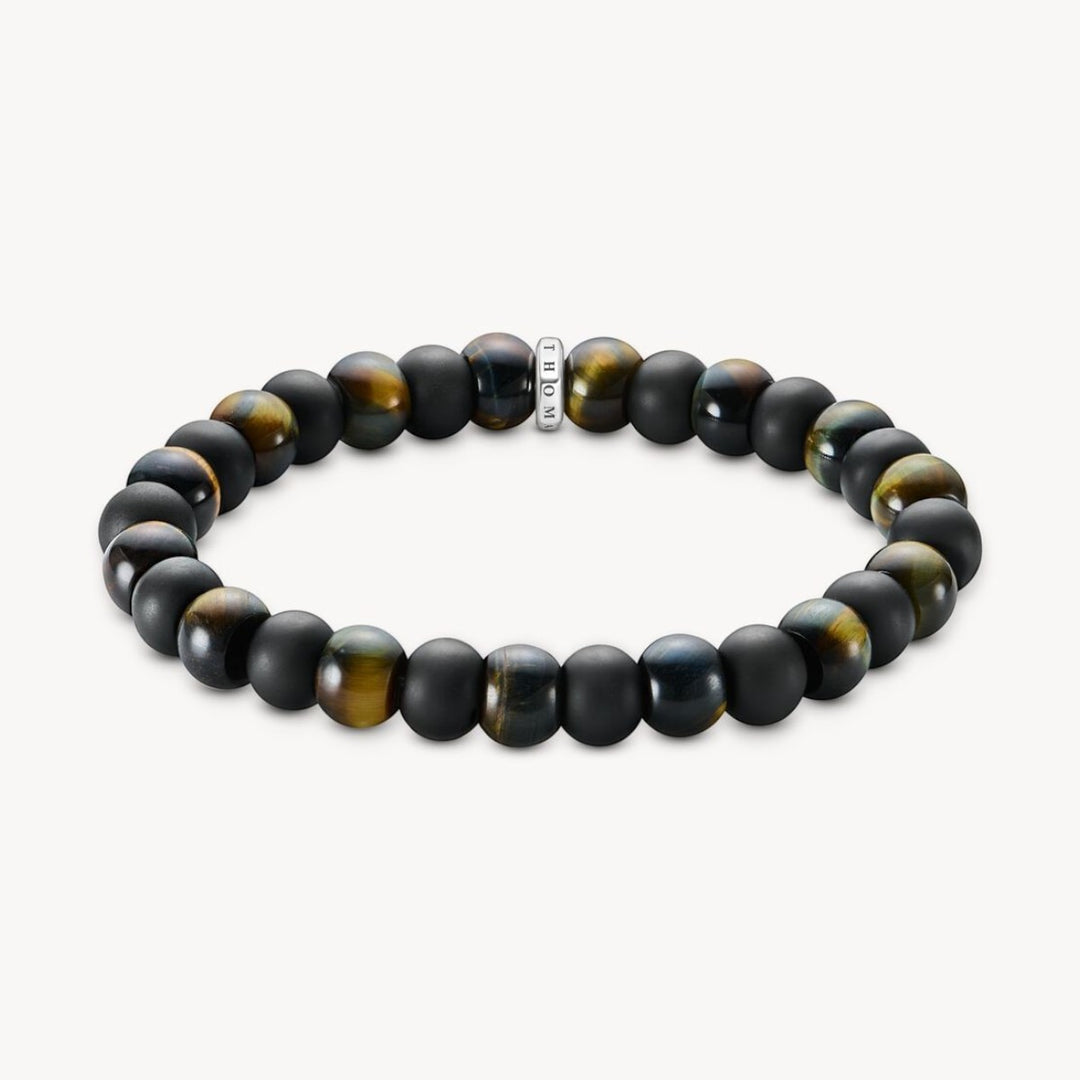 Niche Jewellery Thomas Sabo bracelet with 9mm matte obsidian and blue-gold tiger's eye beads, elasticated.