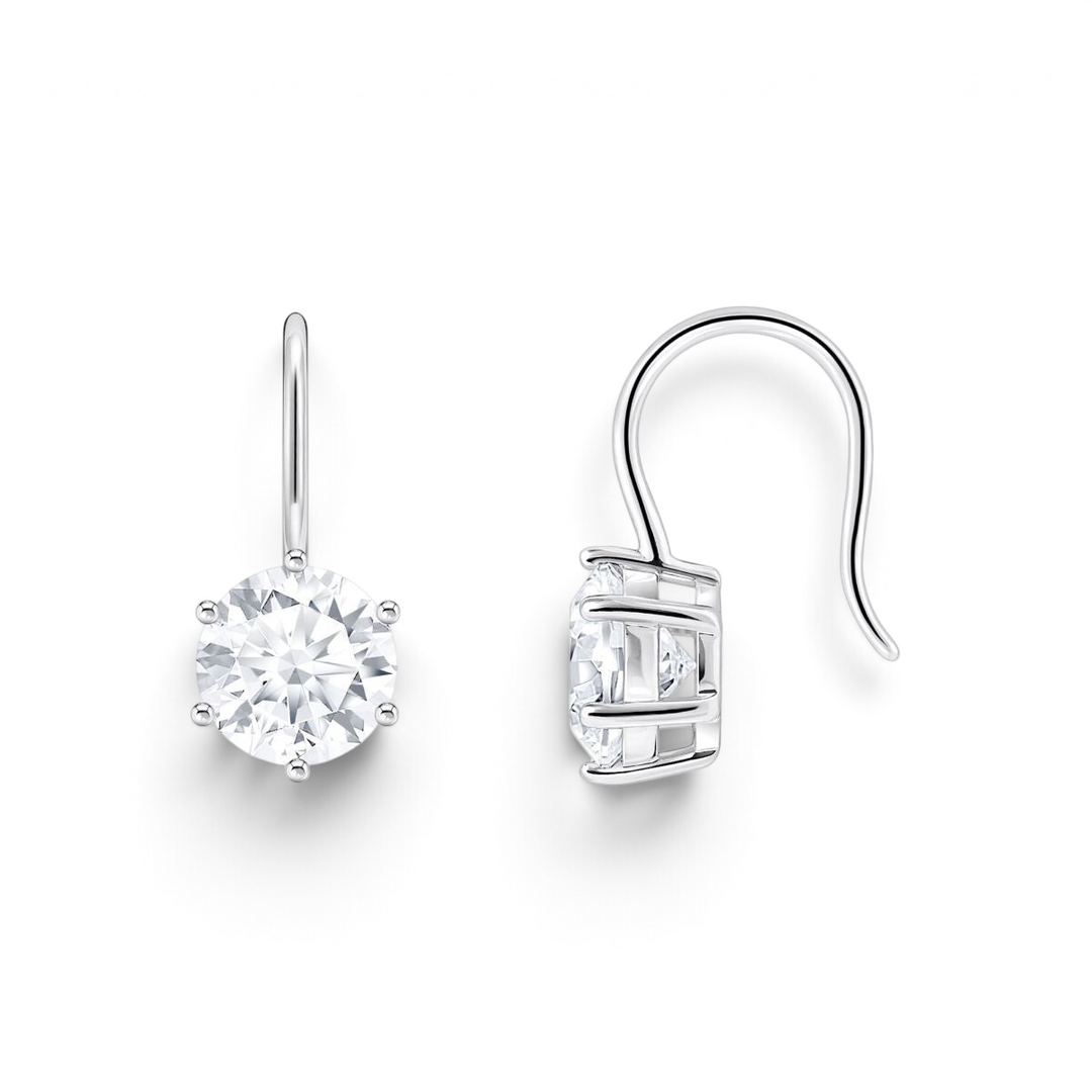Niche Jewellery Thomas Sabo silver hook drop earrings featuring round cabochon-cut white zirconia stones.
