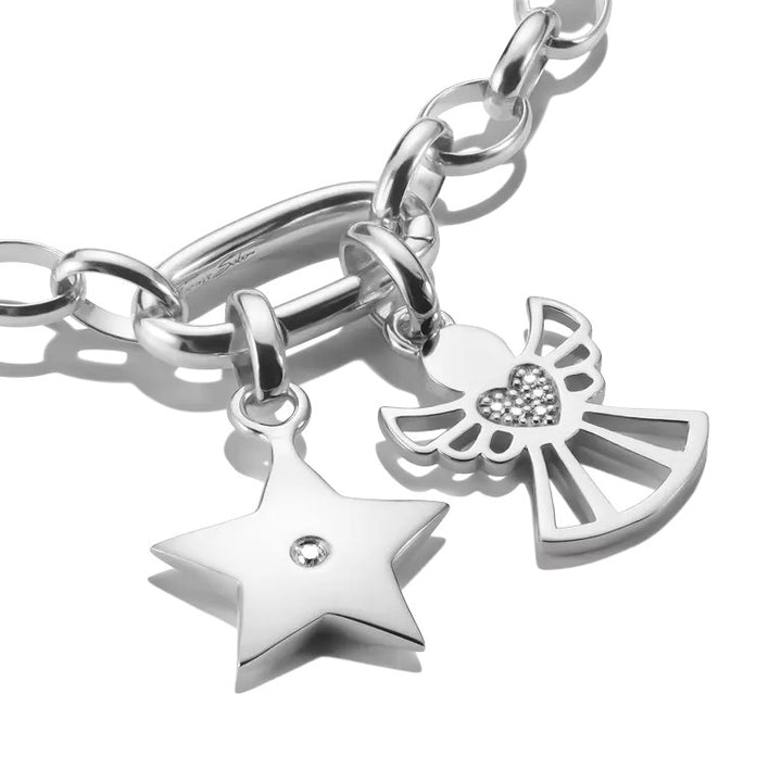 Thomas Sabo sterling silver star charm pendant with white zirconia stone on a bracelet.