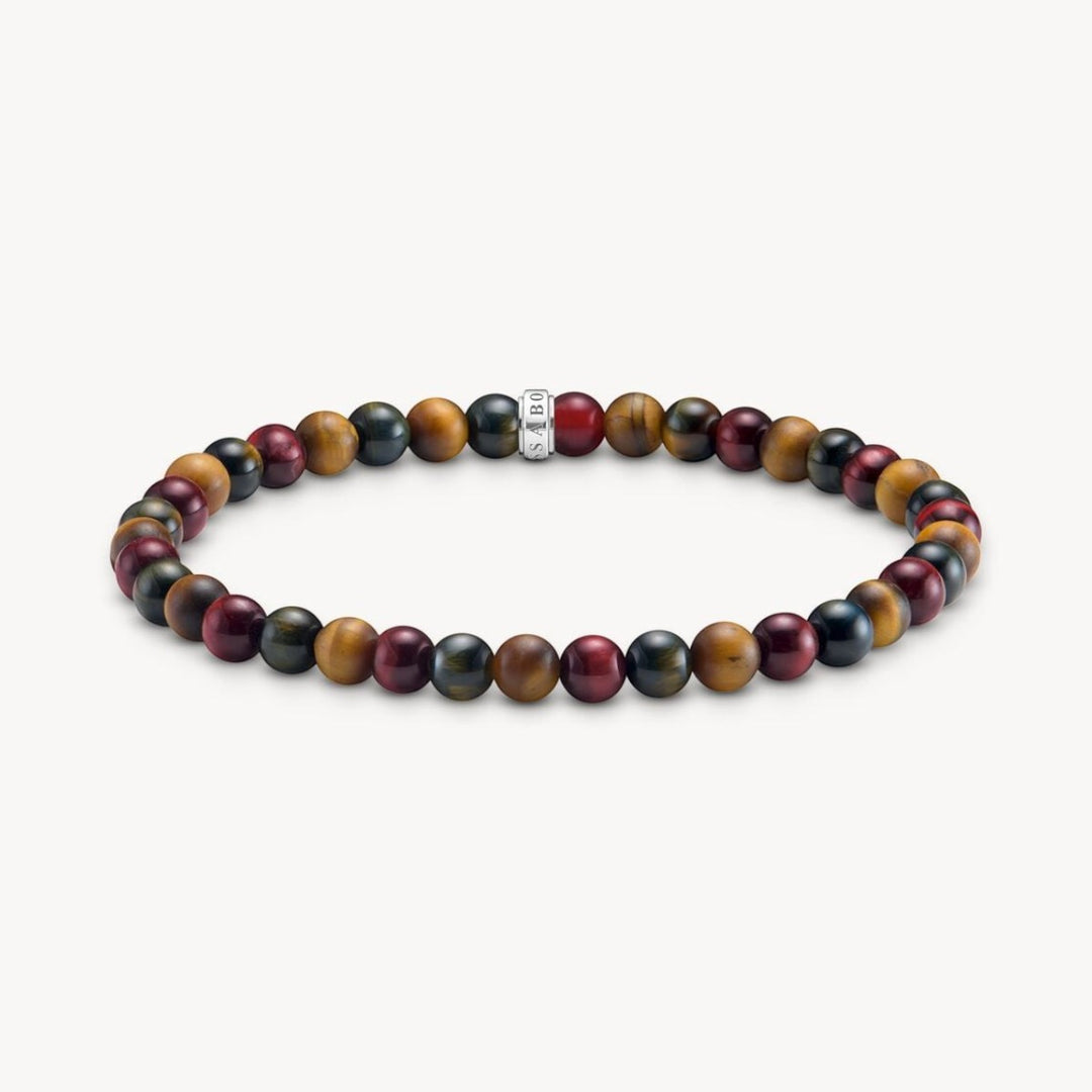 Niche Jewellery Thomas Sabo bracelet with red, brown, and blue tiger eye beads and silver accent.